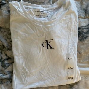 New Calvin Klein white Brand Tshirt. New with tags. Size XL.